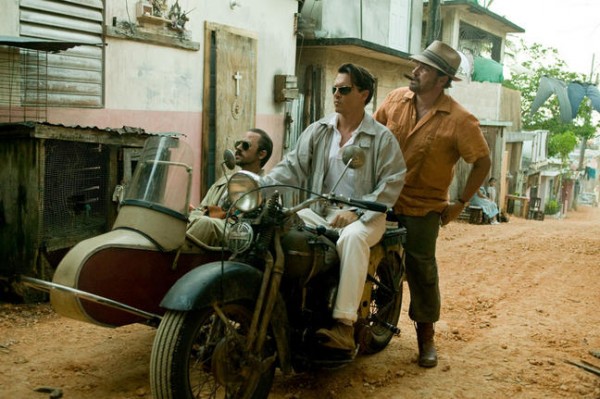 Michael Rispoli and Johnny Depp in THE RUM DIARY