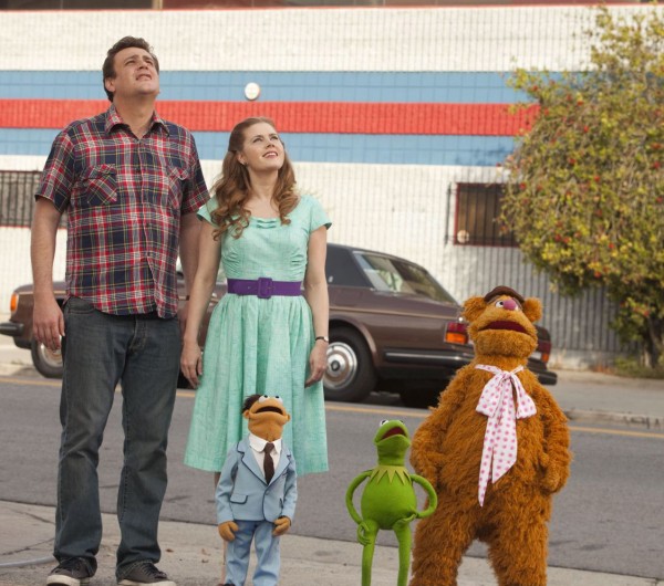 Gary, Mary, Walter, Kermit and Fozzie check out the paragraph above their heads for any misspellings.