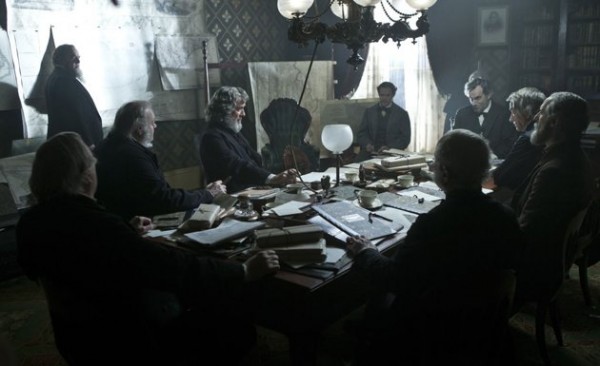 Daniel Day Lewis as Lincoln sitting with his Cabinet