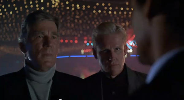The evil General McAllister and Mr. Joshua, President of the Blade Runner fan club.