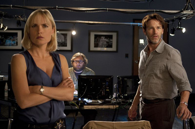 Detective Burquez (Radha Mitchell) Reece (Stephen Moyer) are stunned as they watch the video