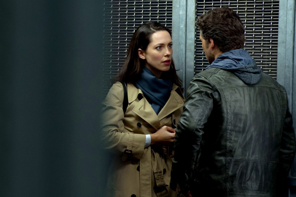 Rebecca Hall as Claudia meets secretly with Martin