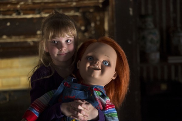 Alice holding her new best friend Chucky