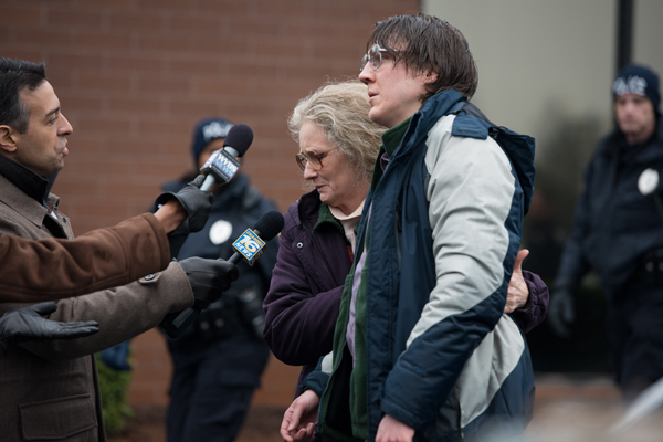Jones (Paul Dano) and his mom (Melissa Leo) leave the police station