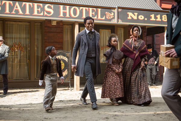 Solomon Northup (Chiwetel Ejiofor) with his family in Saratoga Springs, New York prior to his abduction