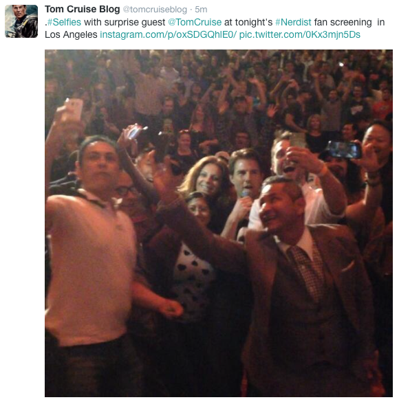 Fans take "selfies" with star of "Edge of Tomorrow" Tom Cruise at the historic Chinese Theater in Hollywood
