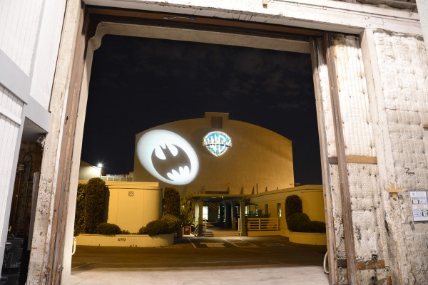 From within a Sound-stage on the lot, a cool view of the Bat-signal shining across the way onto Stage 16 at Warner Bros Studios