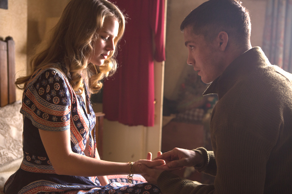 Emma (Alicia Von Rittberg) and Norman (Logan Lerman) take a time out from war in FURY