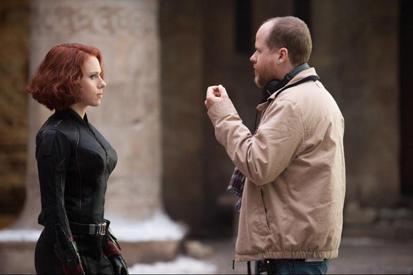 Joss Whedon goes over a scene with Scarlett Johansson in Avengers Age of Ultron