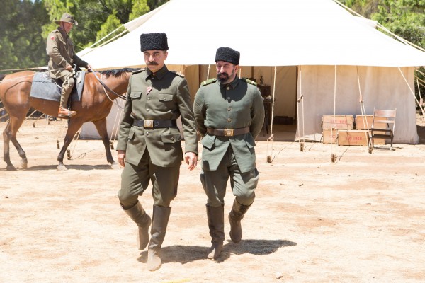 Major Hassan played by Yilmaz Erdogan walks with his Sergant  at Gallipoli burial ground